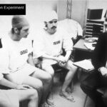 Rich and other prisoners meeting with Prison Superintendent Zimbardo.